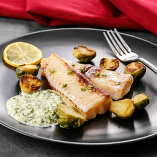 Kabeljau mit Rosenkohl und Kräuterbutter